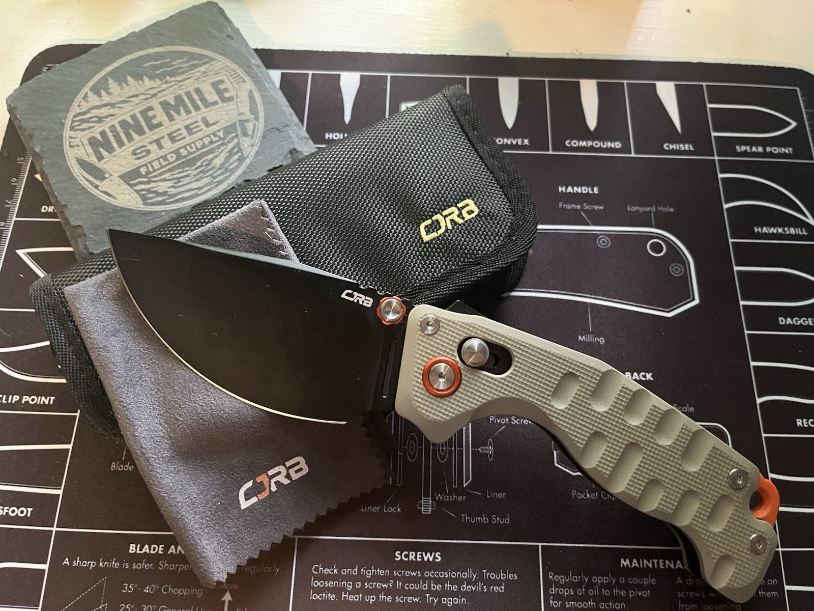 CJRB Double Tap Knife, Recoil Lock, Thumb Studs, Black D2 Blade, Tan G10 Handle