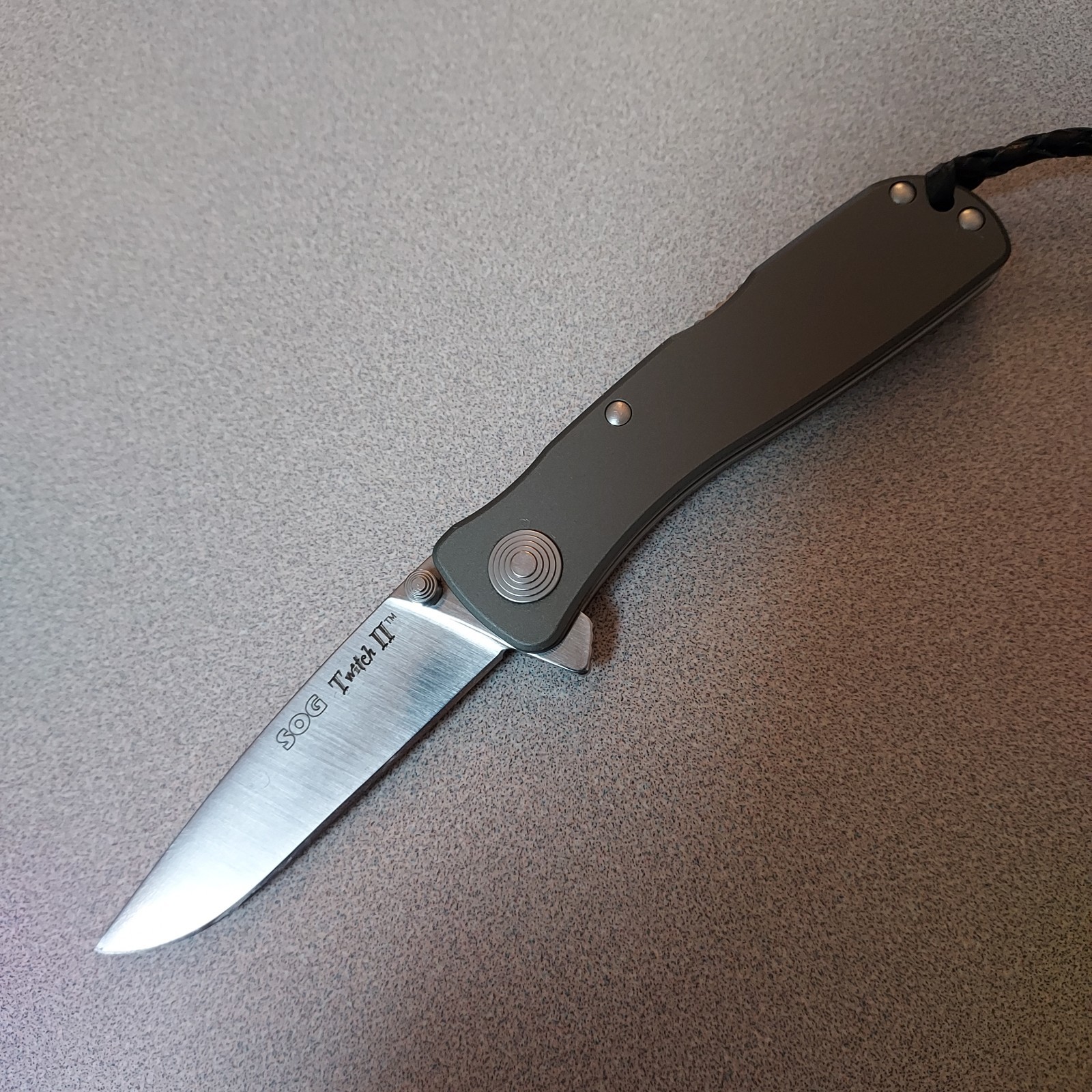 SOG Twitch II Folding Knife Aus-8 stainless, SAT assisted opening. lock back