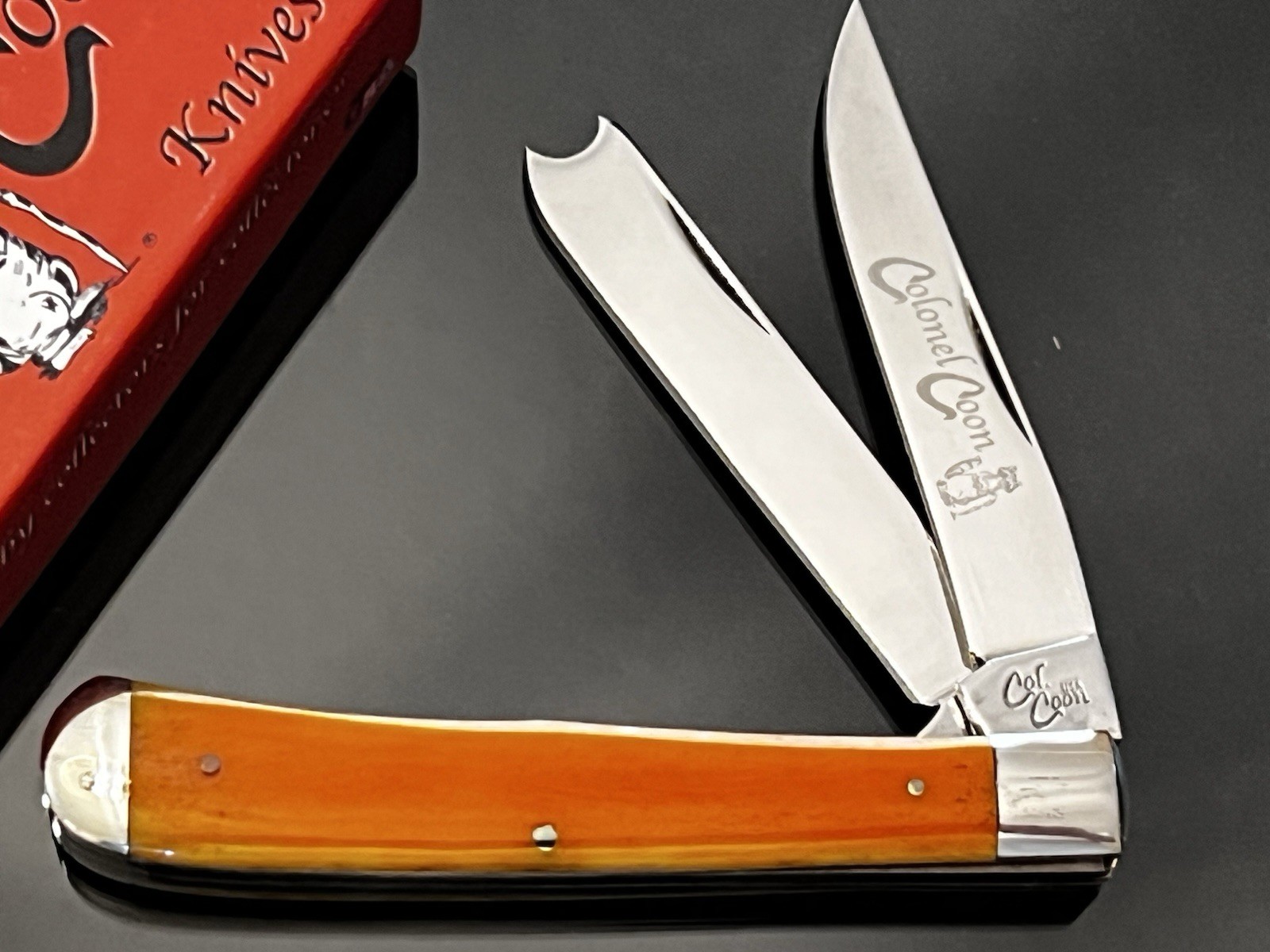Rare Colonel Coon USA One Arm Razor Trapper 4-1/8” Smooth Orange Bone Knife NEW.