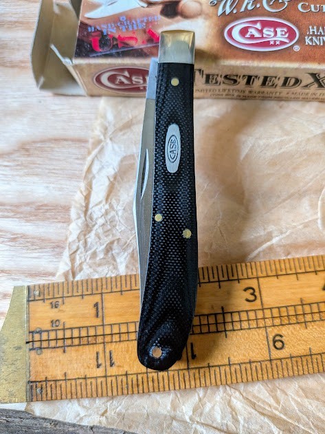 2009 CASE black micarta utility knife. #101048 SS, with box