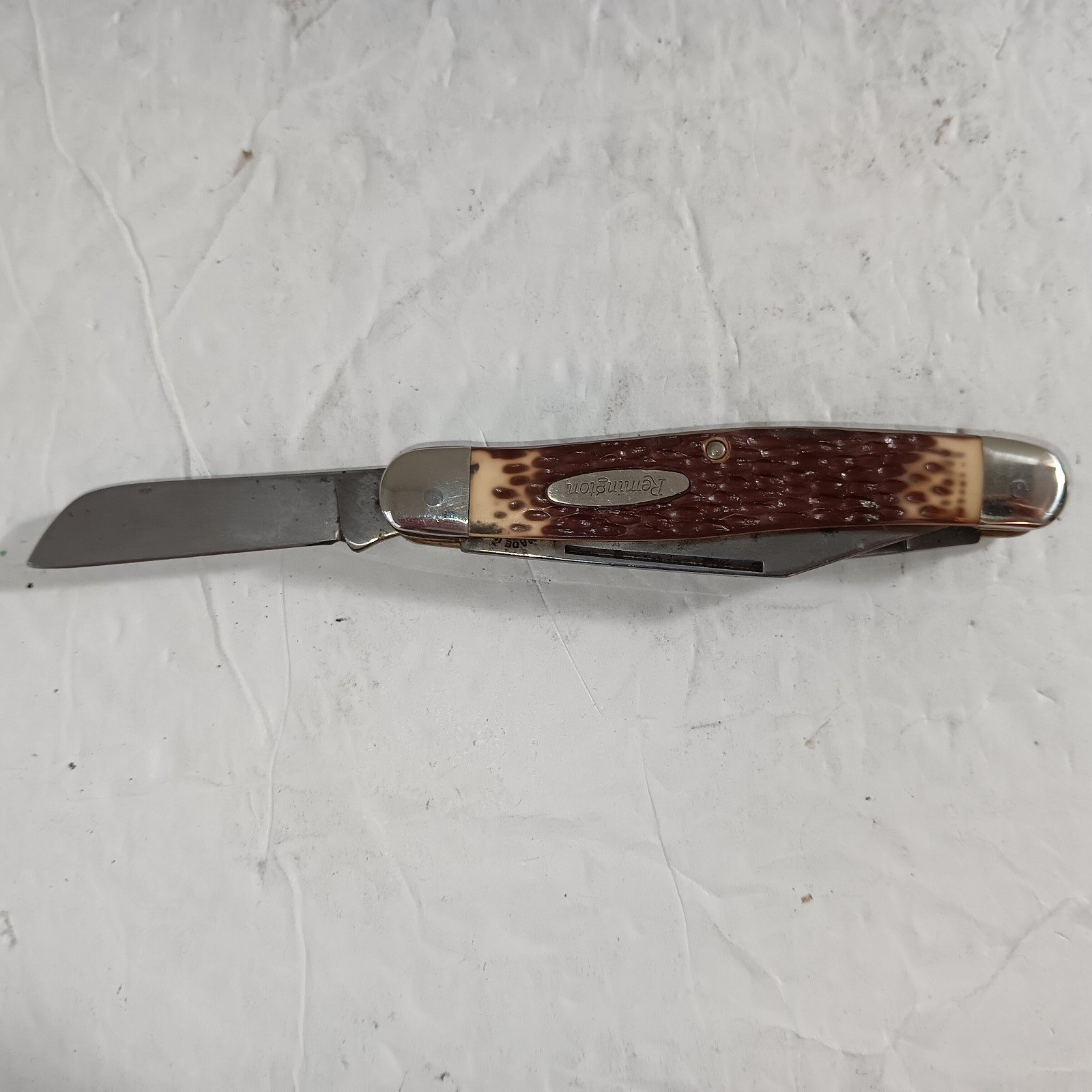 Vtg. Post 1980 Remington Jigged Delrin 3 Blade Folding Pocket Knife