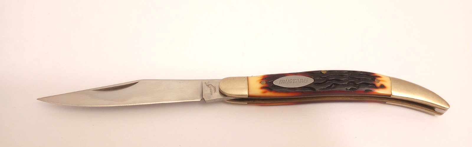 Small Mustang Texas Toothpick Knife With Jigged Handle 3″ Blade 7″ Overall
