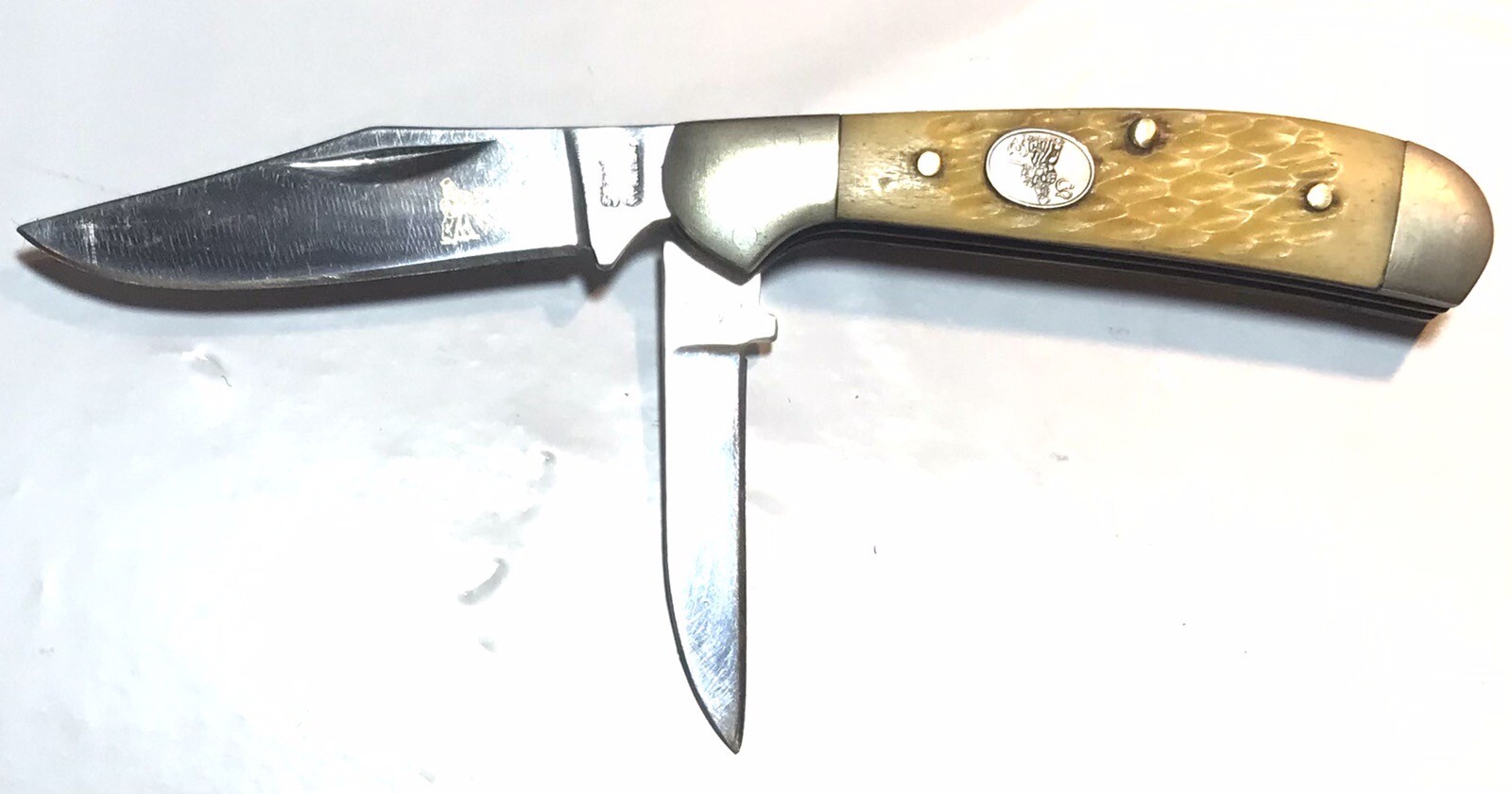 3-3/8″ CLOSED STEEL WARRIOR POCKET KNIFE JIGGED BONE HANDLE 440SS BLADES GUC
