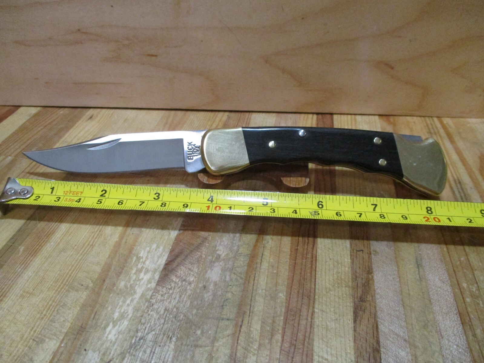 NIB Buck Ebony Finger Groove 110 Folding Hunting/Pocket Knife and Sheath – 2538