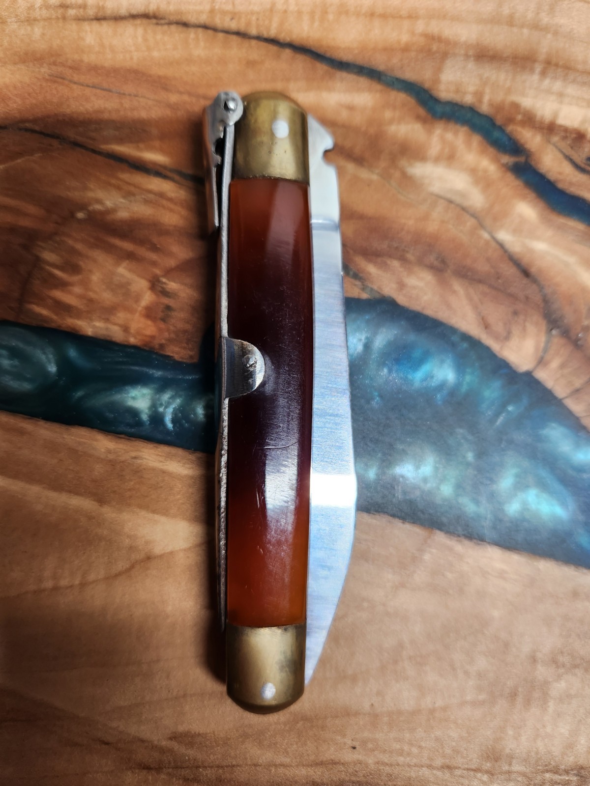 Toledo Spanish Style Folding Knife, with a Brown Polymer and Brass Handle.