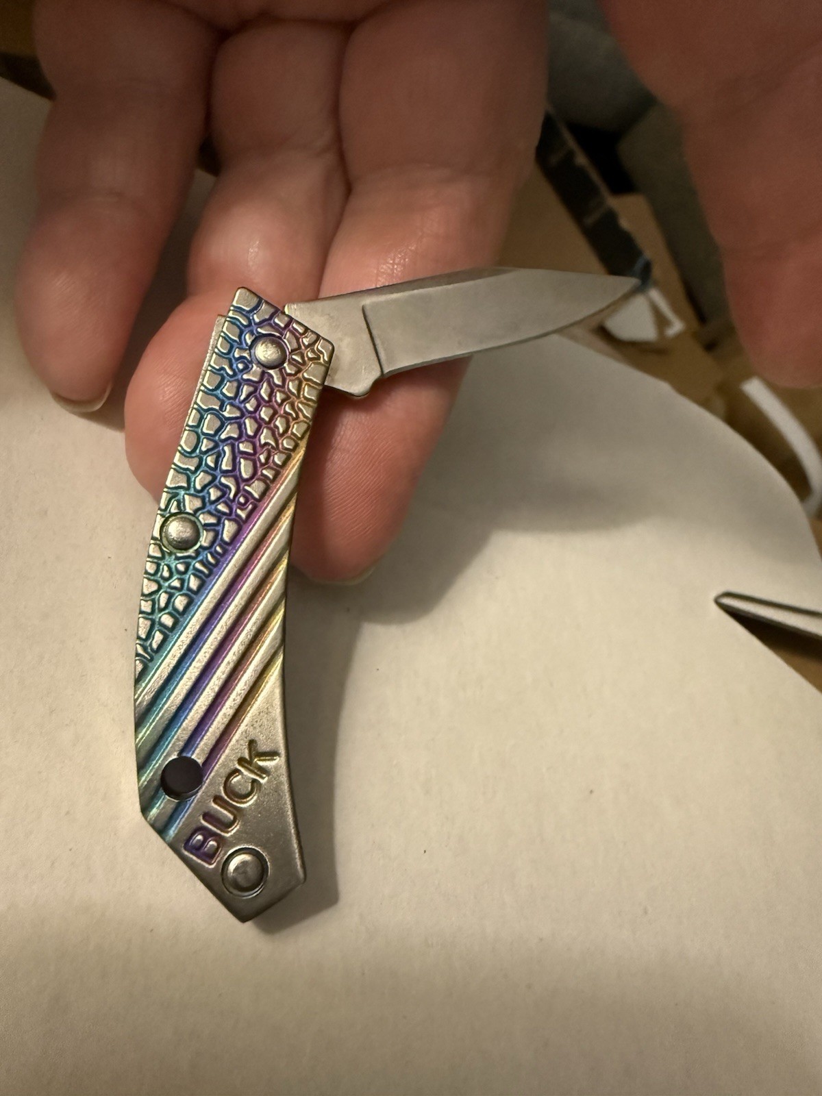 Buck 565 C 1995 Rainbow Tiny Titanium Gentleman’s Pocketknife Unused, no box